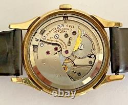 14 Karat Gold fi. Universal Geneve Monodatic Bumper Automatic mens watch, 138C